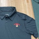 Legacy - Polo Shirt - Solid True Black - Recycled Material Arched Red Chaminade over Split C